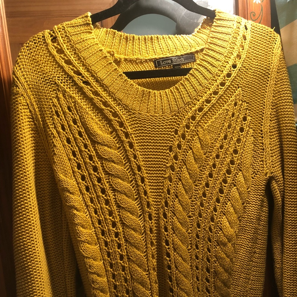 Yellow crew sweater, with brown patch elbows